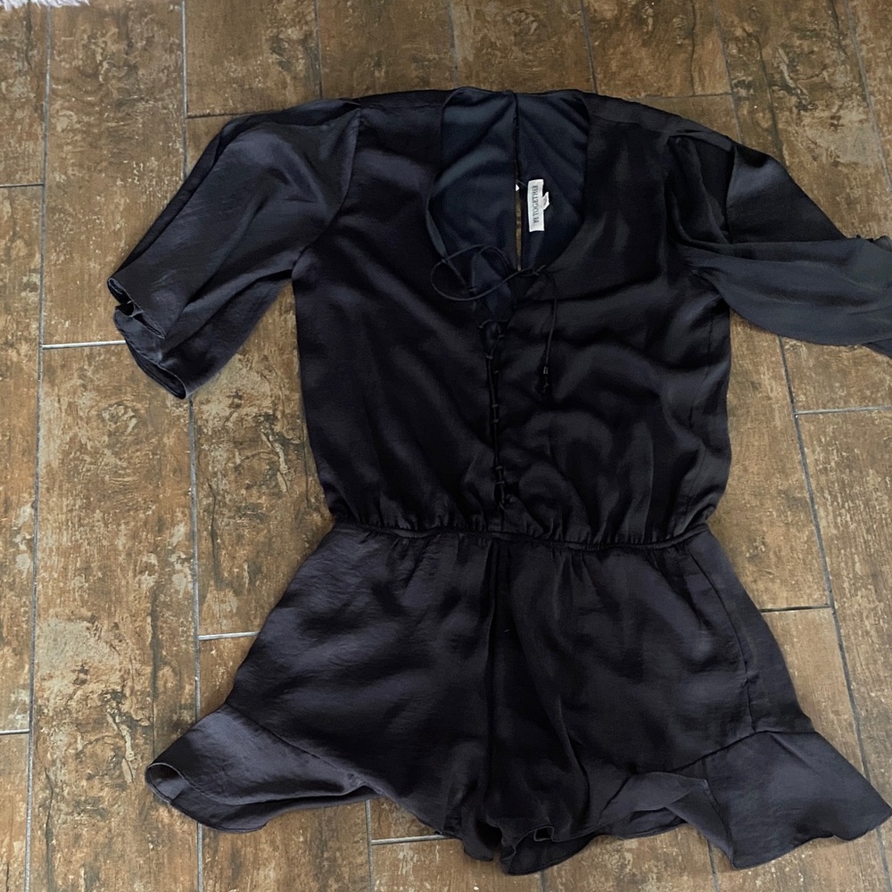 By Together Charcoal Romper. Size medium. NWT. Tie front. Silky feel-lightweight
